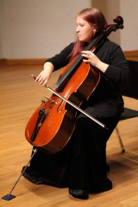 Woman holding a cello